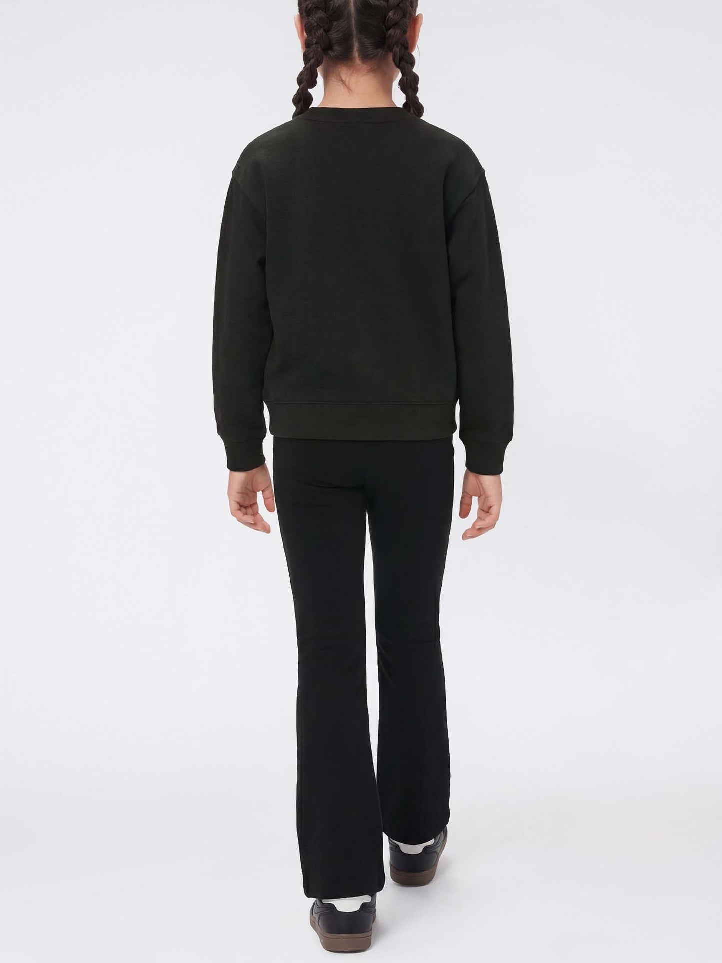 Champion tuta unisex bambino nera in cotone garzato