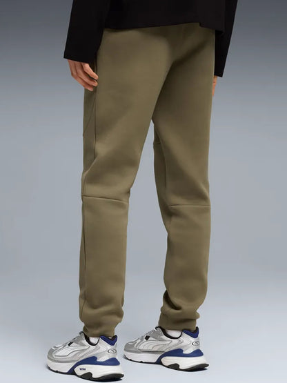 Puma PUMATECH pantaloni sportivi uomo verdi in tessuto tecnico