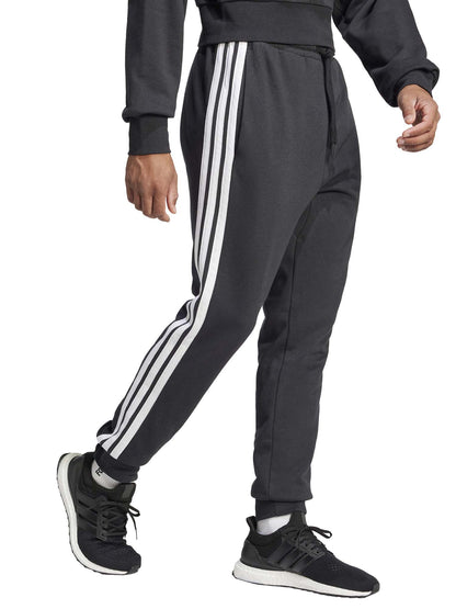 Pantaloni Adidas Essentials 3-Stripes da uomo in nero