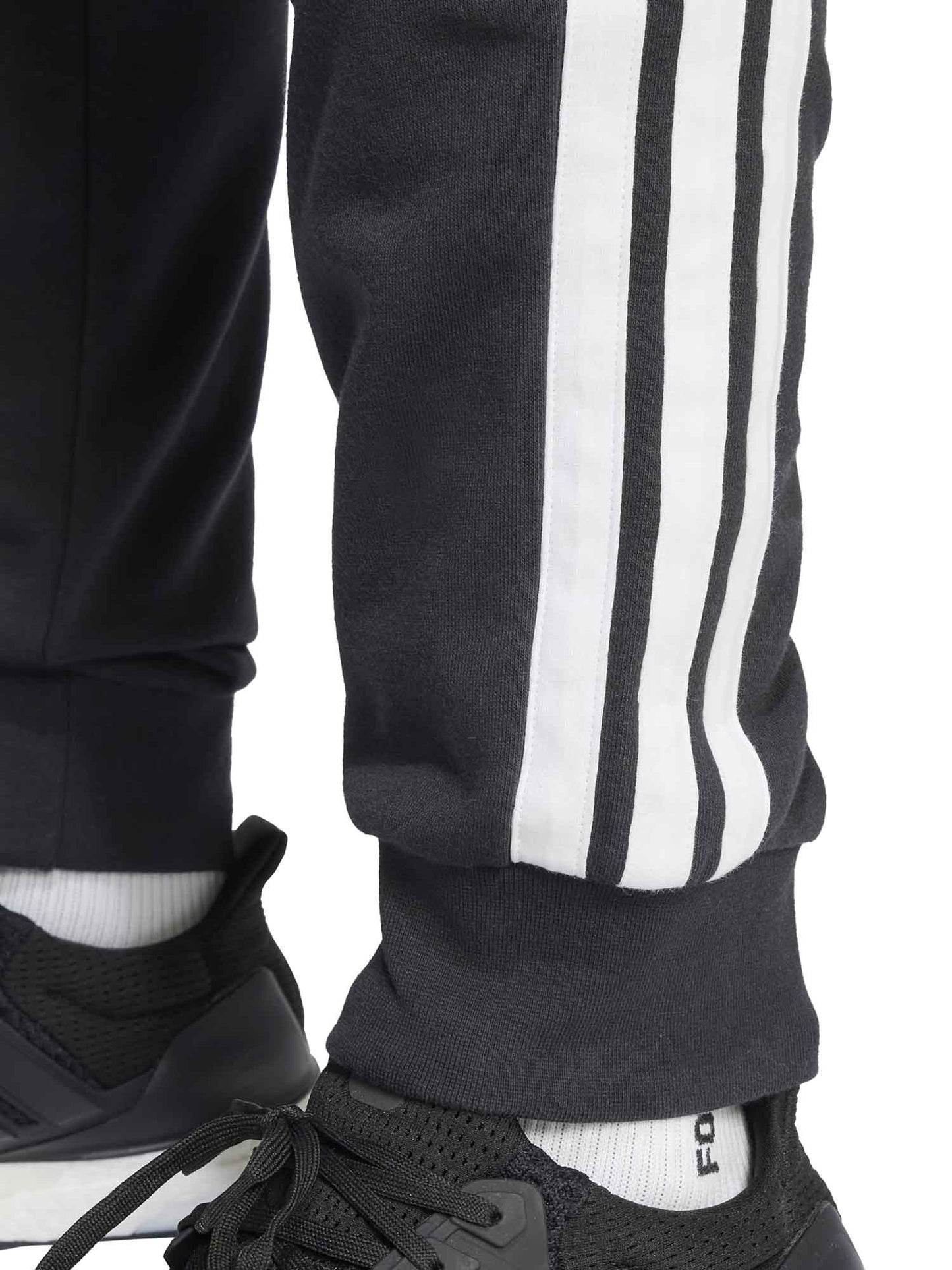 Pantaloni Adidas Essentials 3-Stripes da uomo in nero