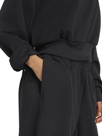 Felpa nera cropped Adidas Soft Lux da donna con scollo girocollo