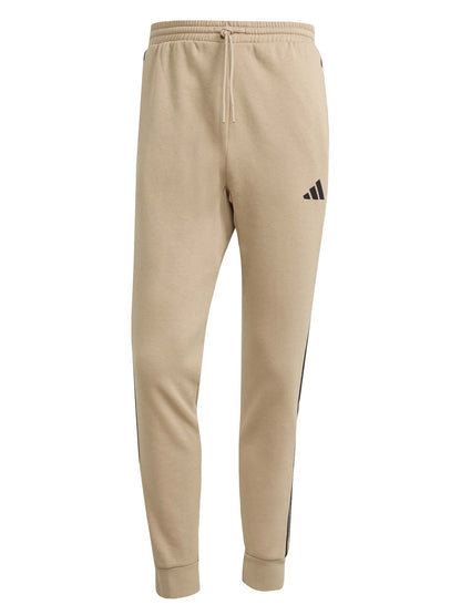 PANTALONE TUTA ESSENTIALS 3-STRIPES FLEECE ADIDAS DA UOMO NOCCIOLA