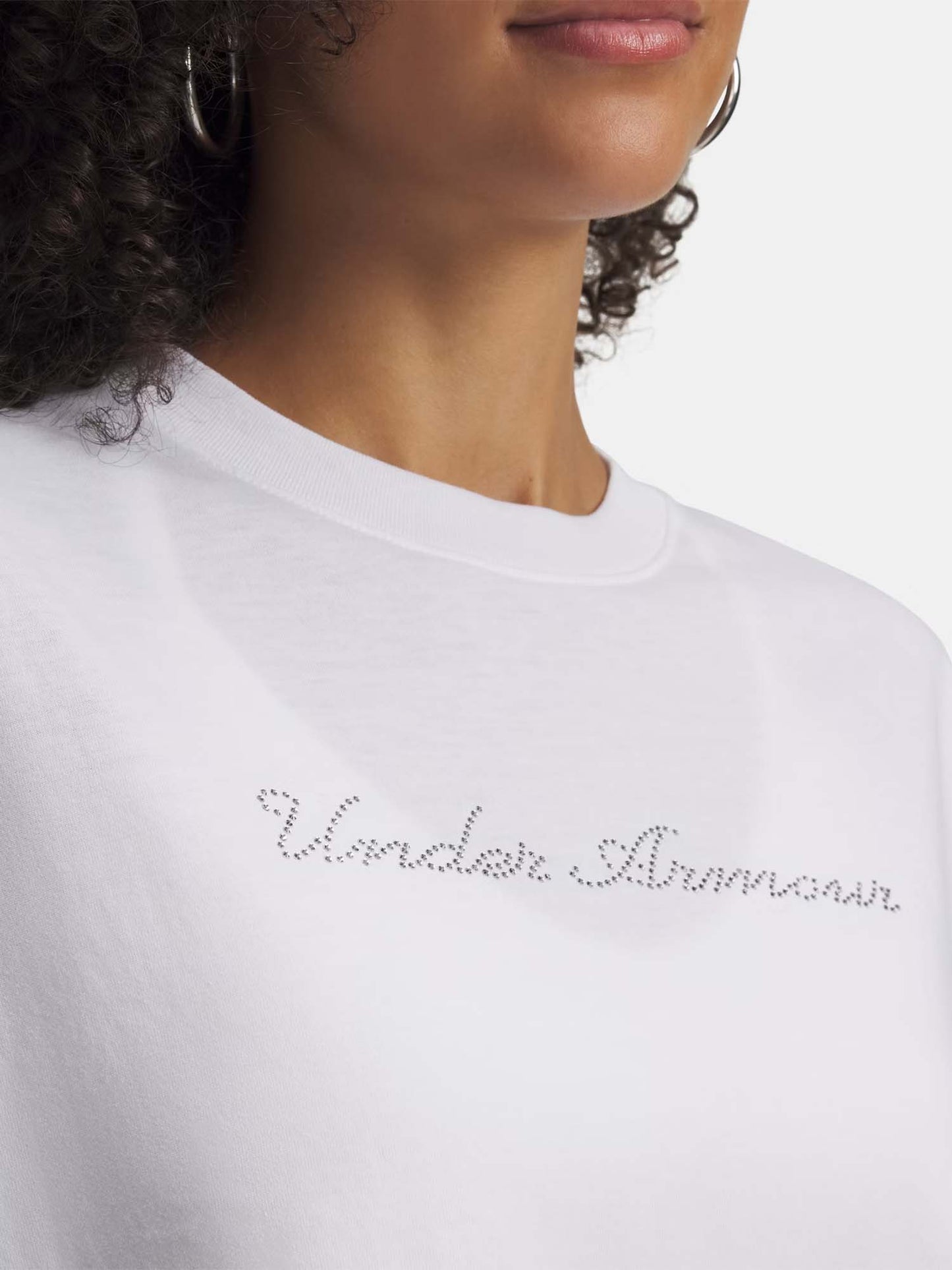 T-shirt crop con logo script Under Armour donna bianca