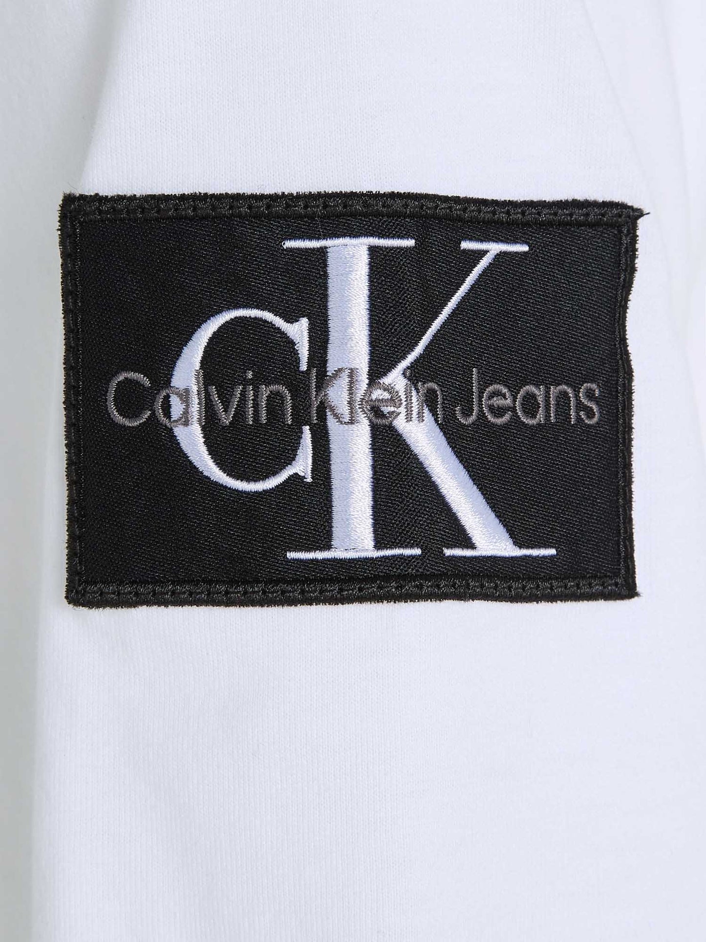 T-SHIRT BADGE REGULAR TEE CALVIN KLEIN JEANS UOMO BIANCO