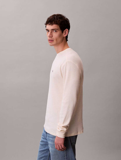 Maglia a maniche lunghe Calvin Klein Jeans panna con patch monogramma
