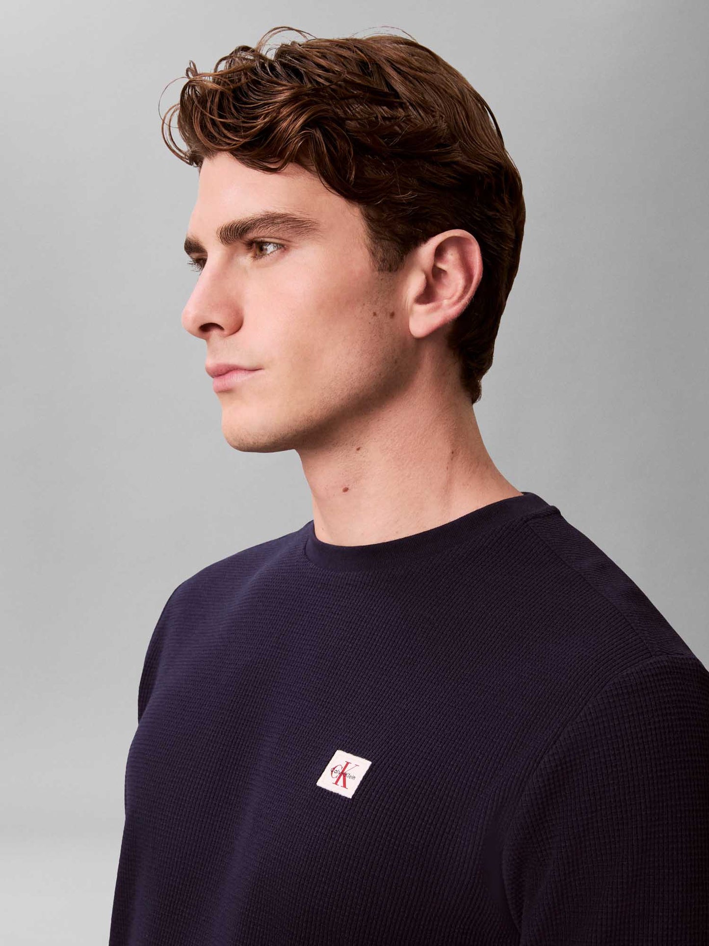 Maglia maniche lunghe blu Calvin Klein Jeans con badge
