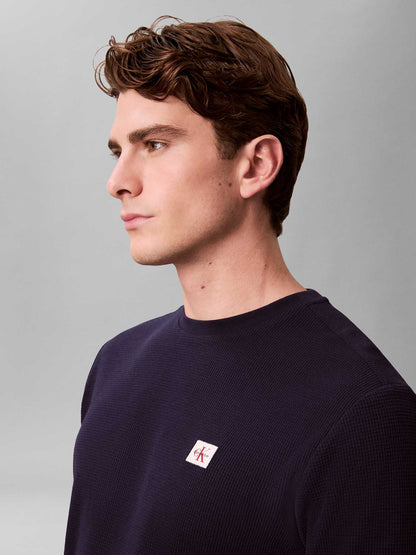 Maglia maniche lunghe blu Calvin Klein Jeans con badge