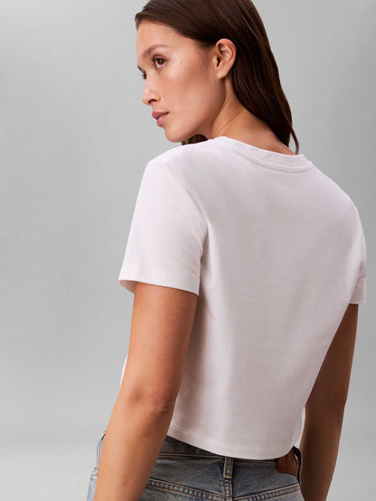 T-shirt bianca cropped Calvin Klein Jeans con logo da donna