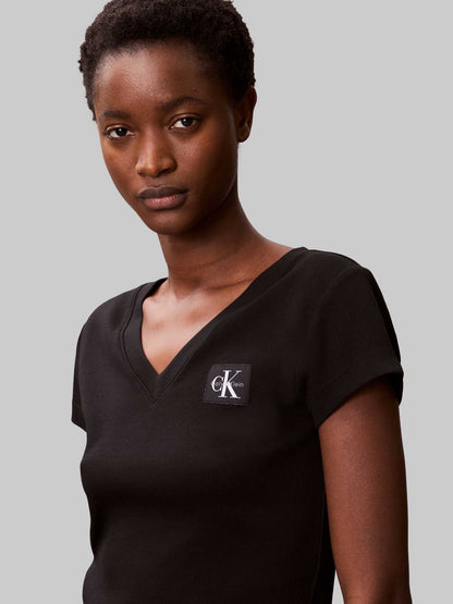 T-SHIRT A COSTINE SCOLLO A V CALVIN KLEIN JEAND DONNA NERO