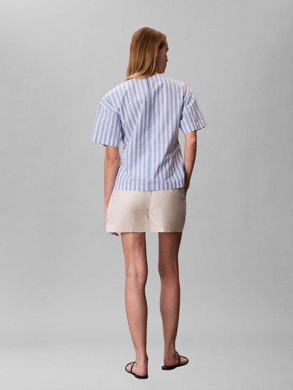Camicia a righe bianca e azzurra Calvin Klein Jeans da donna