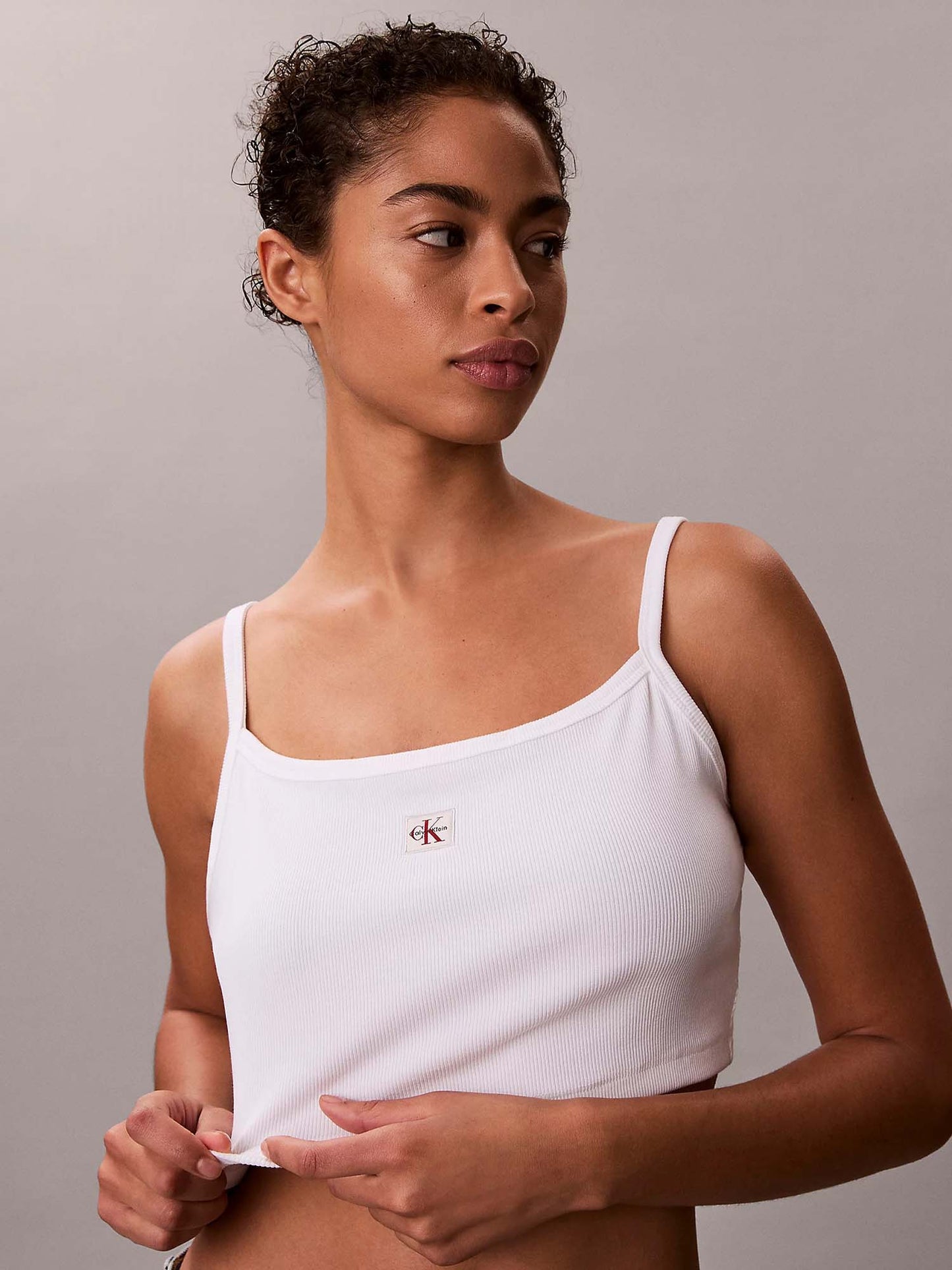 Top crop a costine bianco slim da donna Calvin Klein