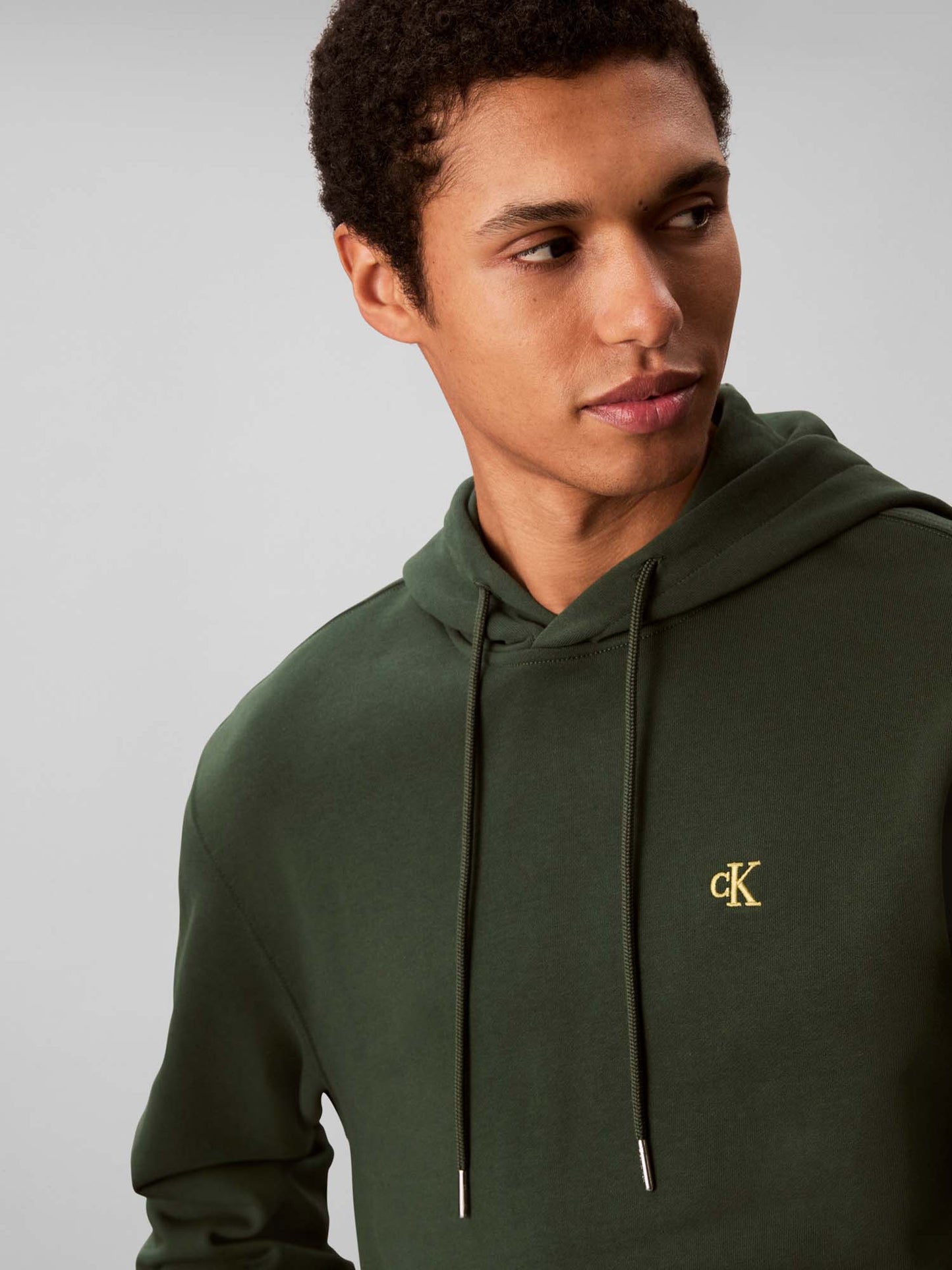 FELPA CON CAPPUCCIO E MONOGRAMMA CALVIN KLEIN DA UOMO VERDE