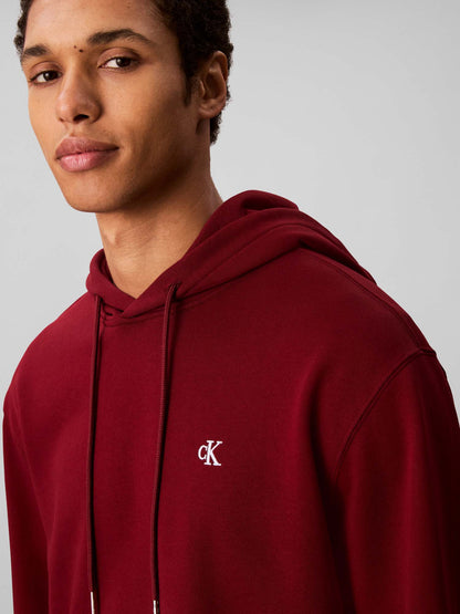FELPA CON CAPPUCCIO E MONOGRAMMA CALVIN KLEIN DA UOMO BORDEAUX
