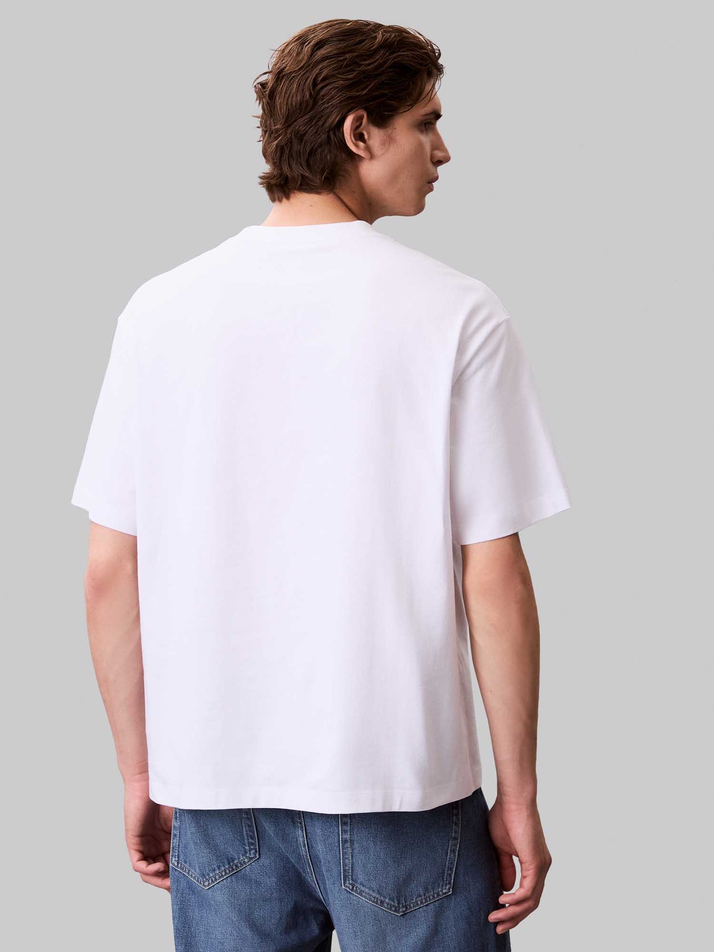 T-shirt bianca Calvin Klein con logo grafico da uomo