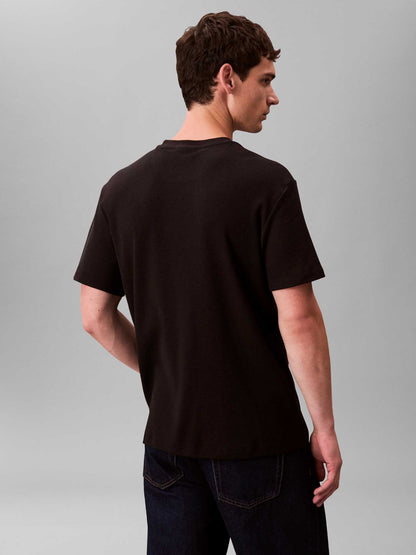 T-shirt nera Calvin Klein Jeans Waffle Badge da uomo