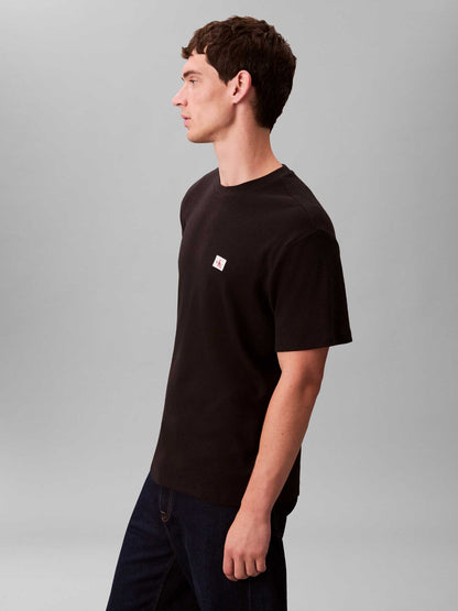 T-shirt nera Calvin Klein Jeans Waffle Badge da uomo