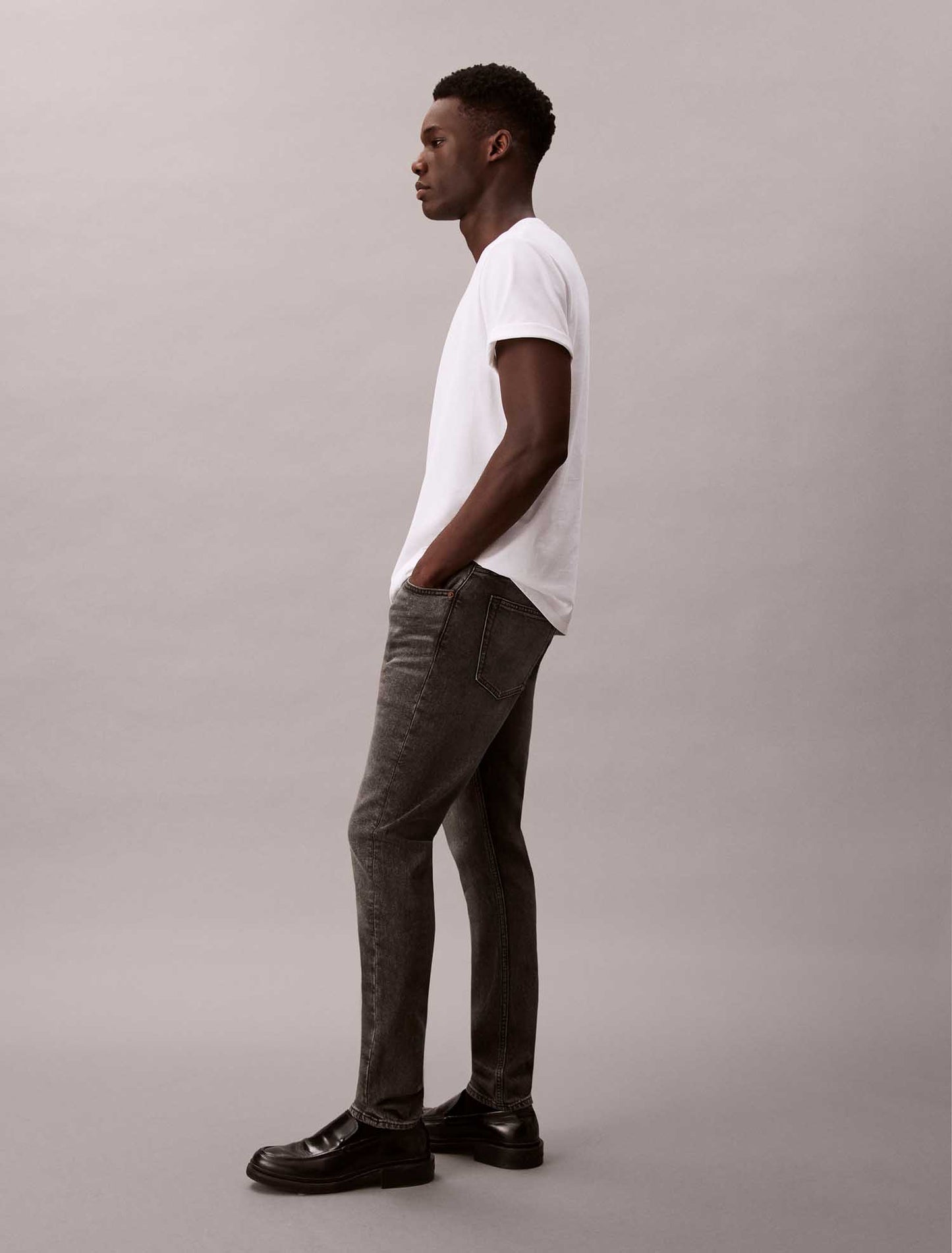 Jeans slim tapered Calvin Klein in cotone elasticizzato da uomo grigio