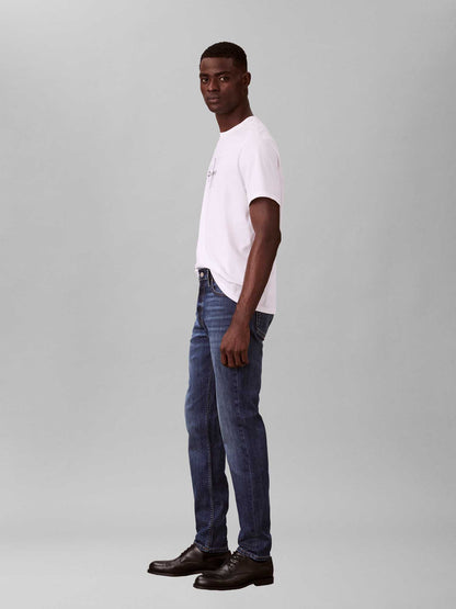 Jeans slim tapered Calvin Klein da uomo in denim blu