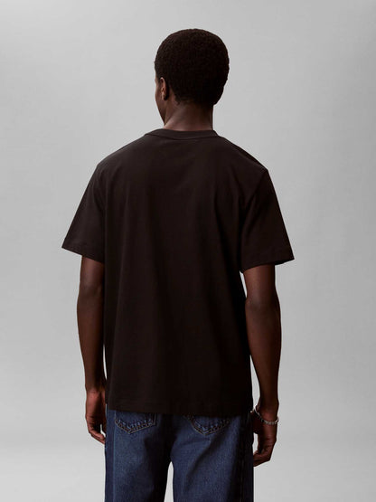 T-shirt nera Calvin Klein Jeans da uomo con tasca logata