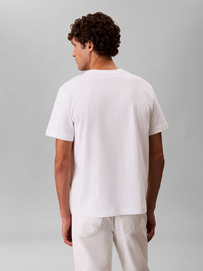 T-shirt bianca Calvin Klein Jeans con tasca logata da uomo
