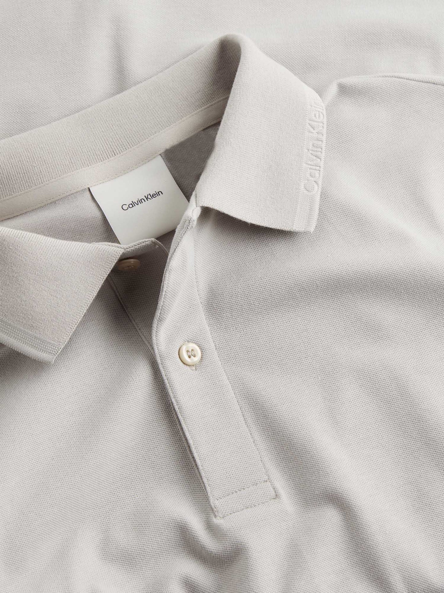 POLO THERMO TECH PIQUE CALVIN KLEIN JEANS UOMO BEIGE