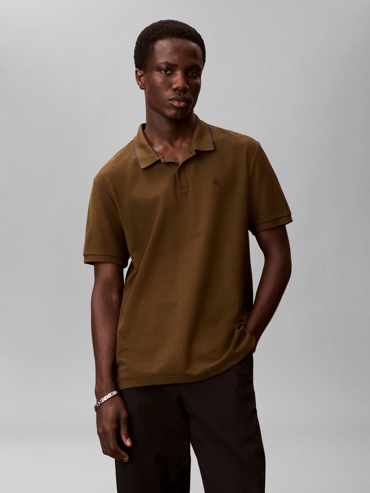 Polo verde da uomo Calvin Klein in cotone piqué refined