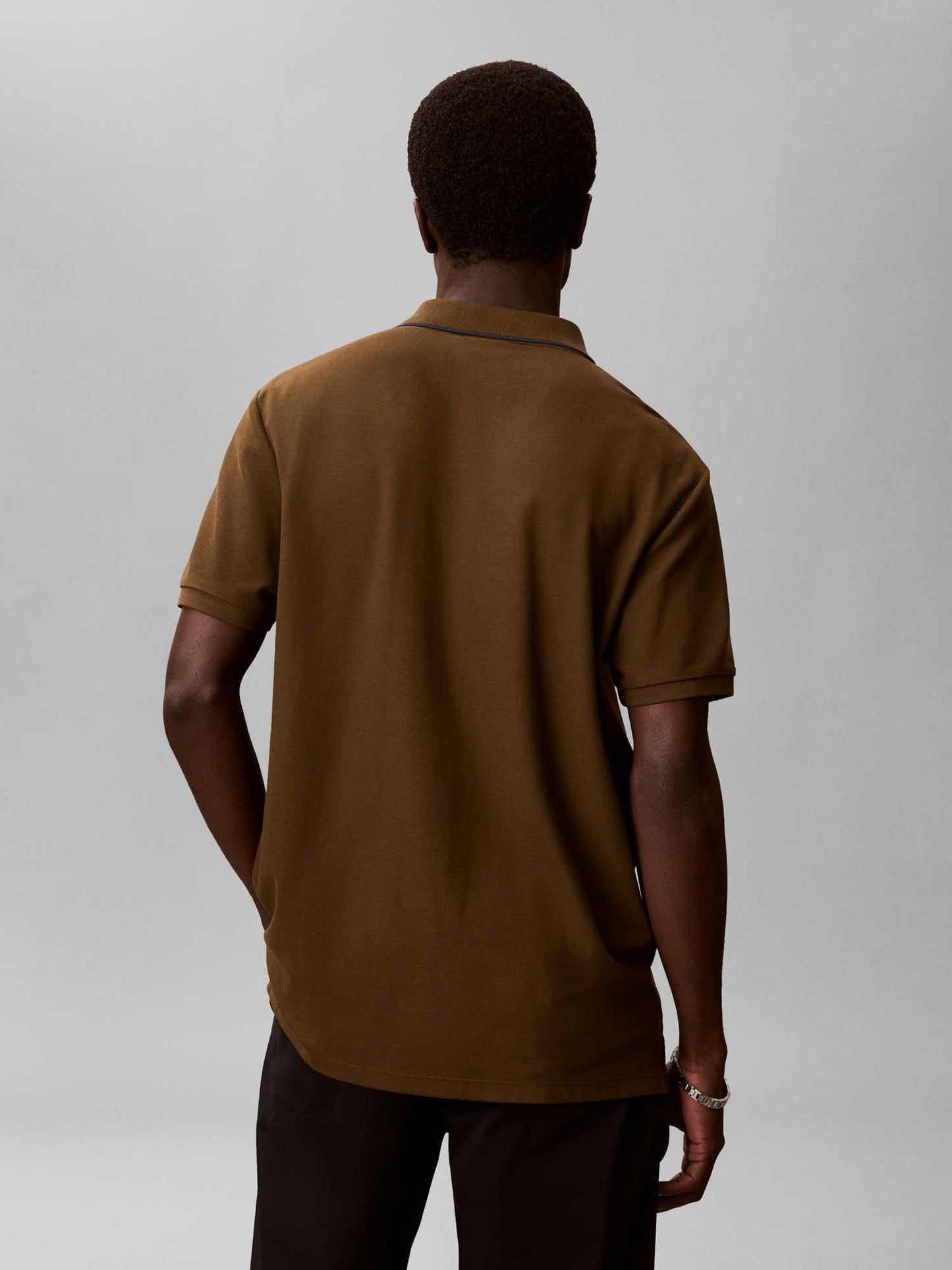 Polo verde da uomo Calvin Klein in cotone piqué refined