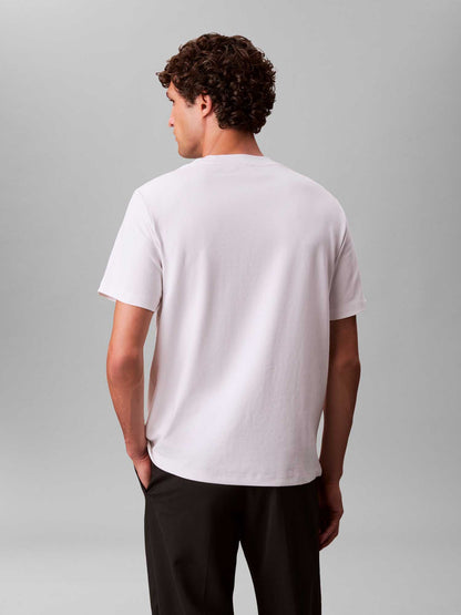 Calvin Klein Jeans, t-shirt bianca da uomo con taglio relaxed