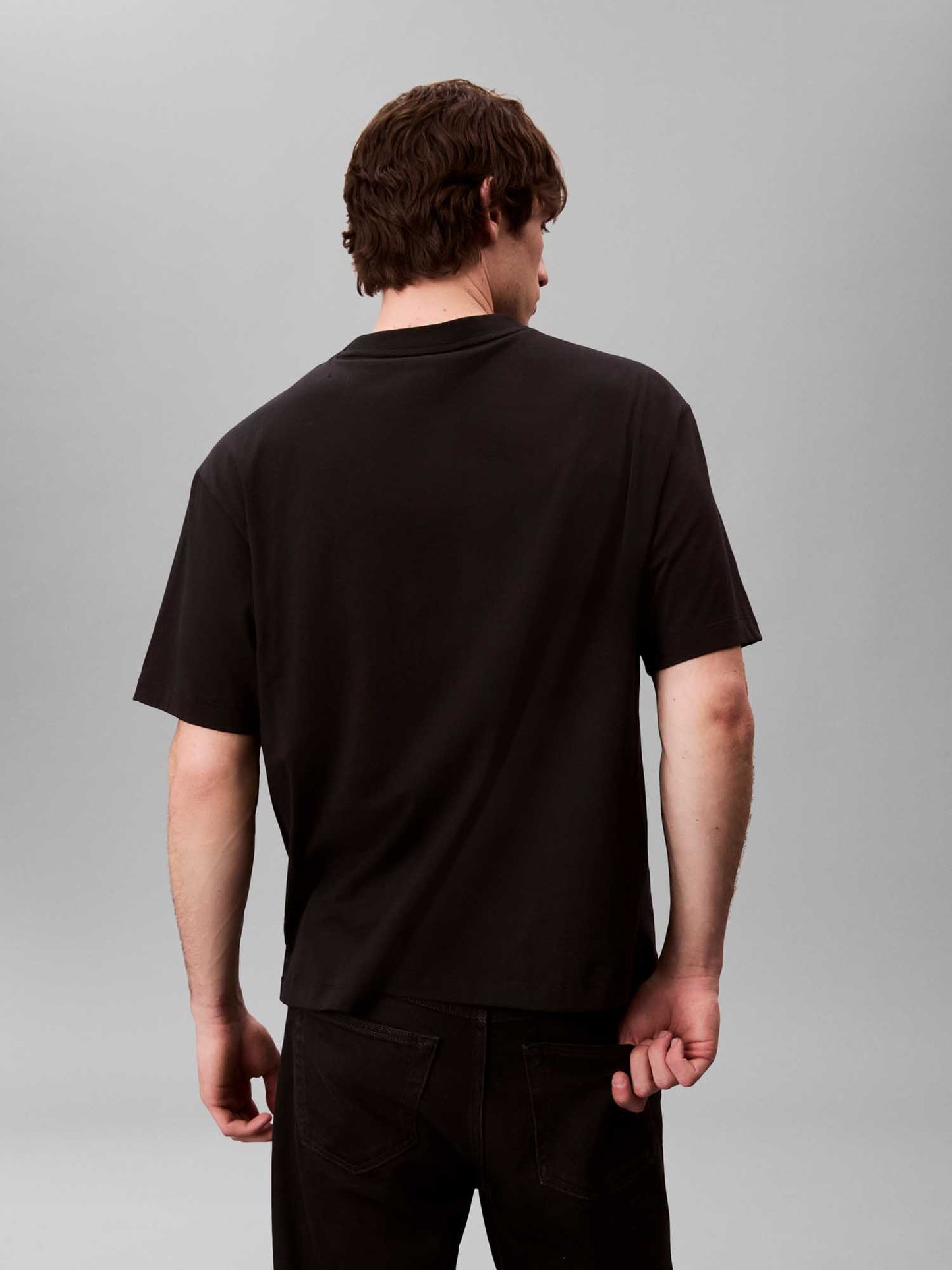 T-shirt nera da uomo Calvin Klein con logo sul petto