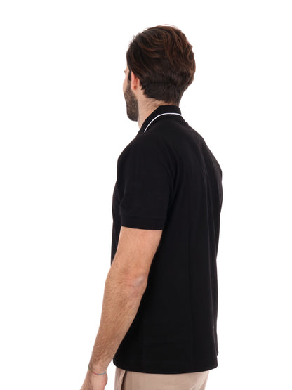 Polo Core Identity in piquet di cotone stretch nero da uomo