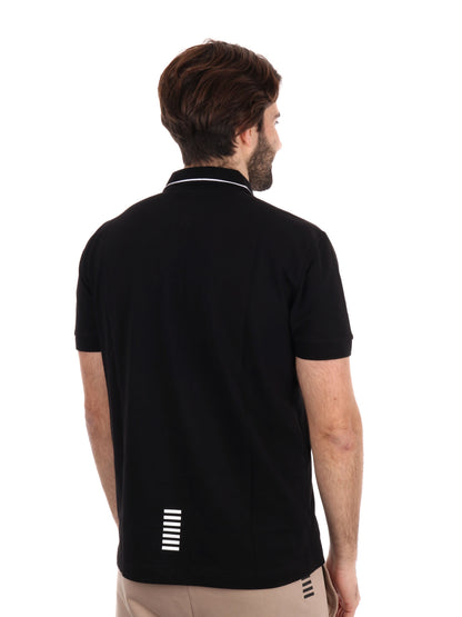 Polo Core Identity in piquet di cotone stretch nero da uomo