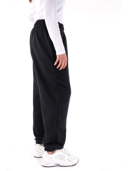 Pantaloni tuta sportivi da donna New Balance neri in tessuto sintetico