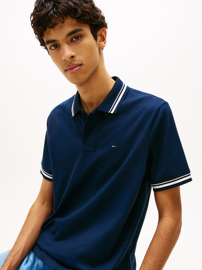 POLO BLU TOMMY JEANS CON FLAG LOGATA DA UOMO