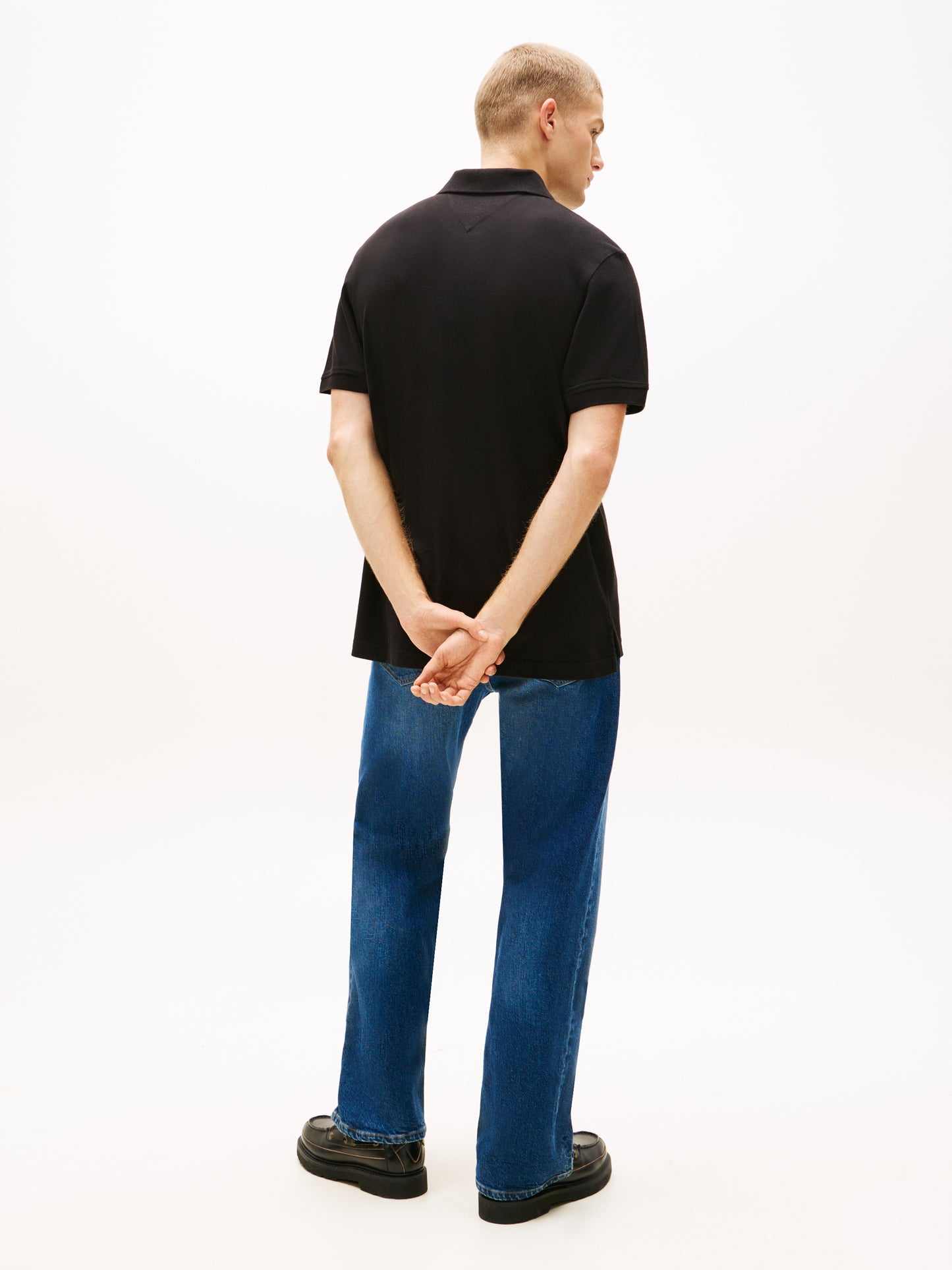 POLO REGULAR NERA TOMMY JEANS CON LOGO DA UOMO