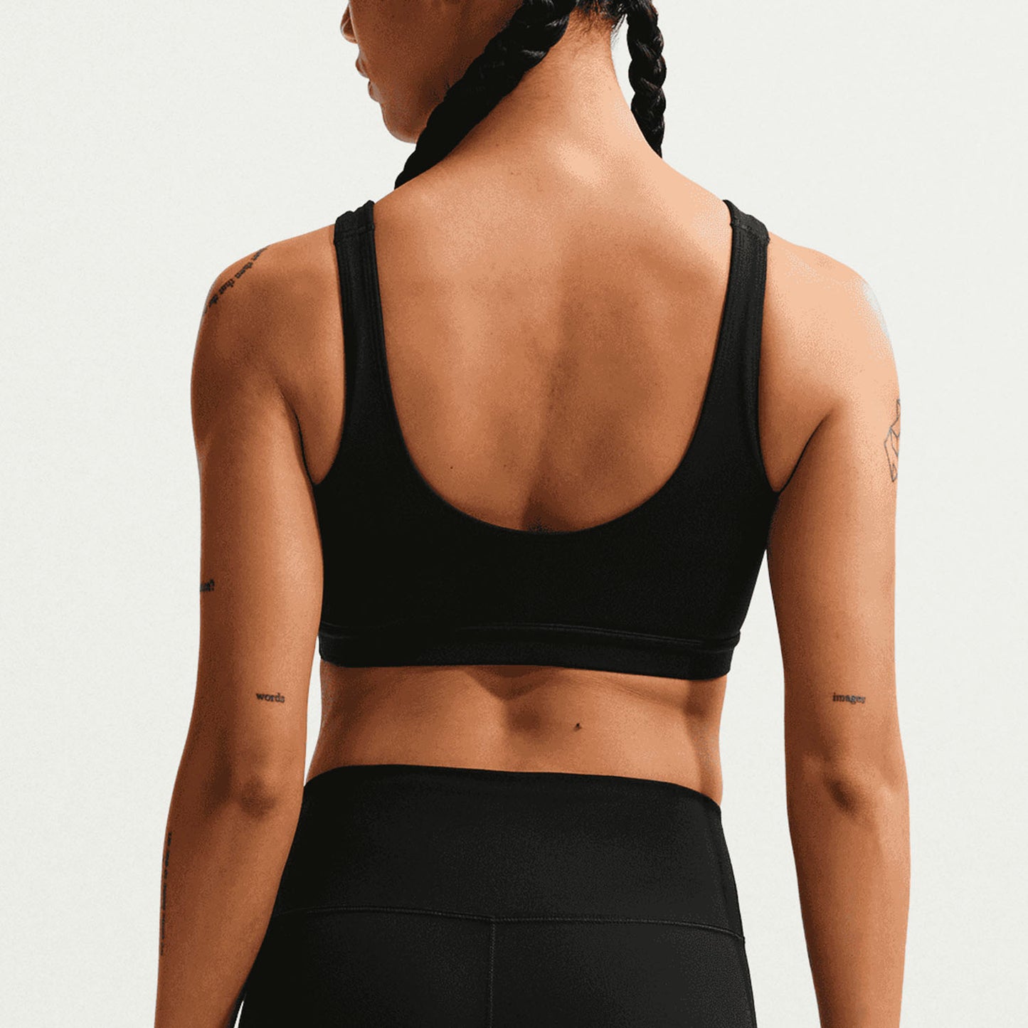 Nike One, canotta sportiva imbottita da donna in nero