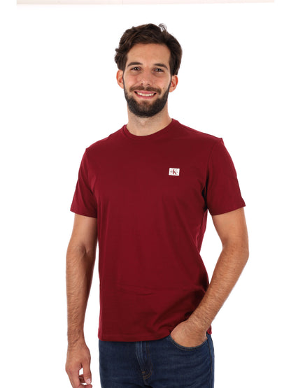 T-SHIRT BADGE CALVIN KLEIN JEANS DA UOMO BORDEAUX