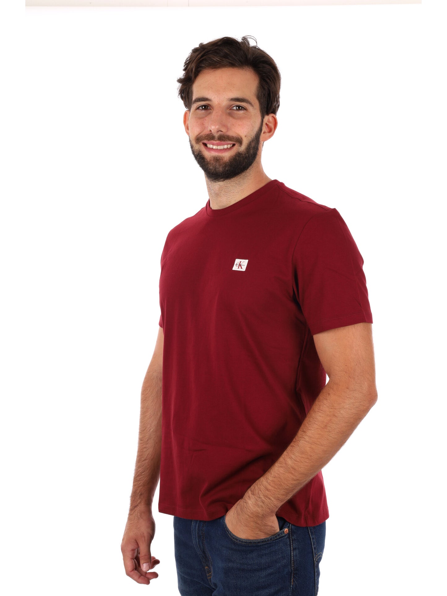 T-SHIRT BADGE CALVIN KLEIN JEANS DA UOMO BORDEAUX