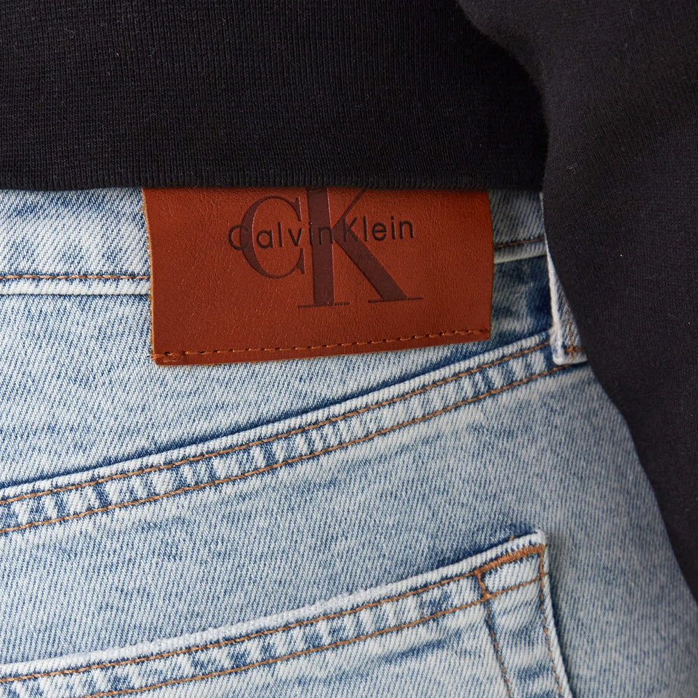 Jeans slim tapered da uomo Calvin Klein in denim marbled