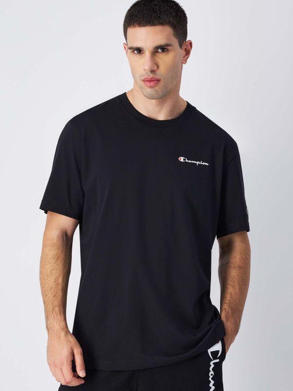 T SHIRT CON LOGO GRANDE CHAMPION DA UOMO NERO 220264 KK001 Online a 19 96 Meca Moda Dress Shoes